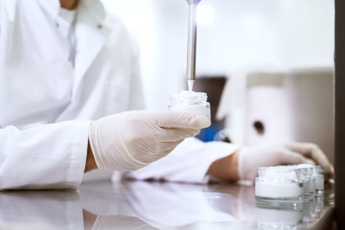 Healthcare creme production in laboratory. Creme products in lab. Healthcare industry.