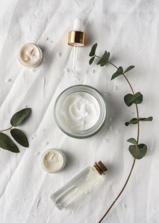 top-view-cream-container-with-plant
