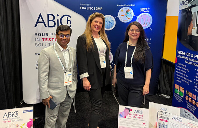 Team members posing at the ABiCh booth during NY Suppliers Fair, showcasing testing and validation solutions at the trade show